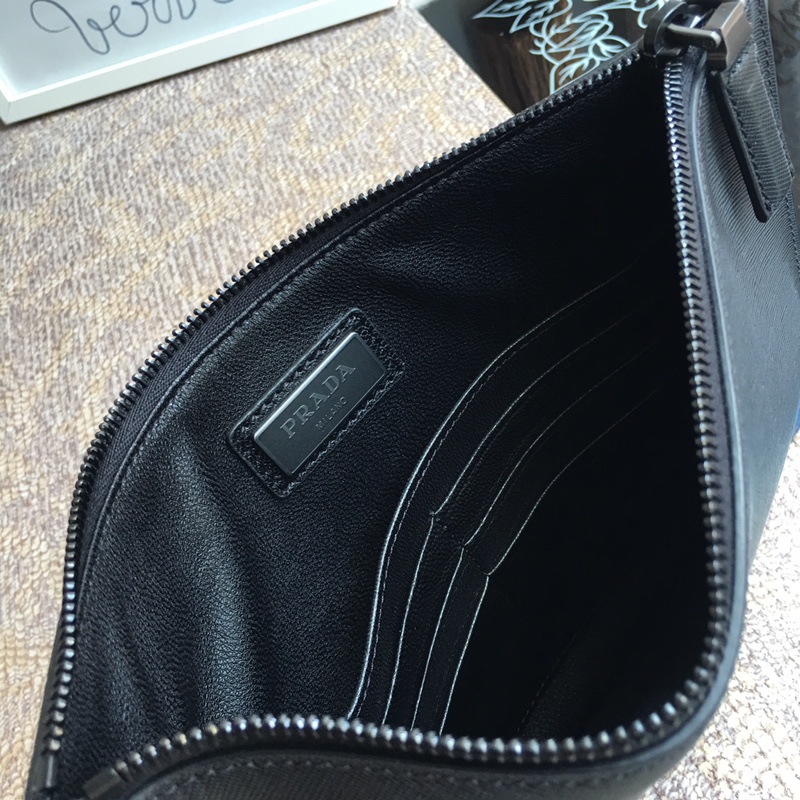 Pra*a clutch bags